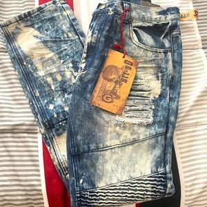 Men’s bleached, distressed, moto, skinny jeans.